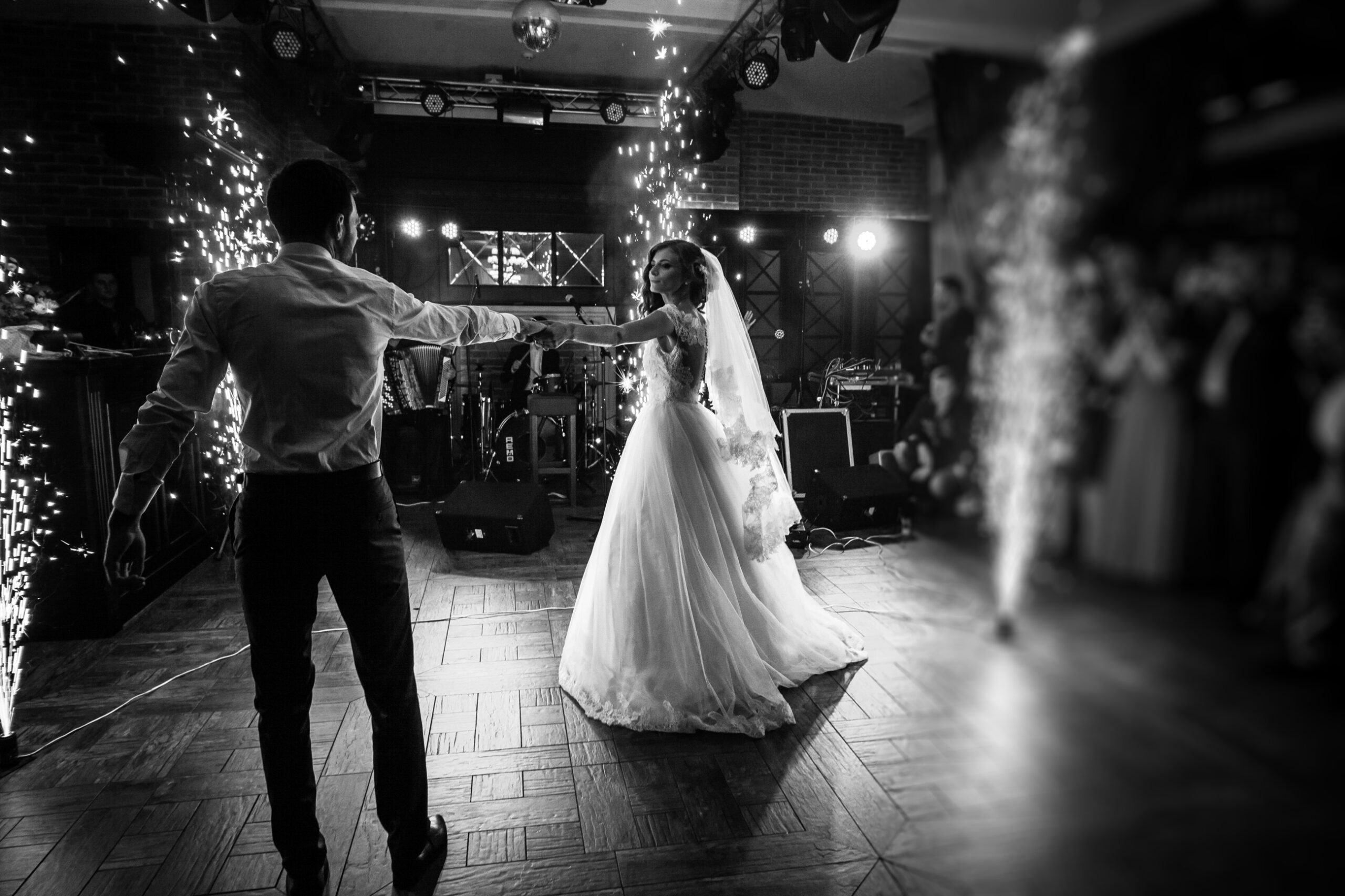 Bride and groom on the dance floor with sparklers