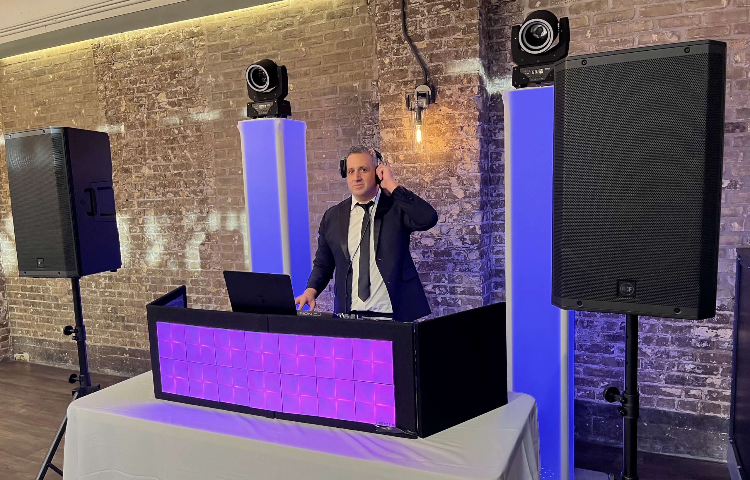 Wedding DJ setup with premium lighting
